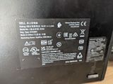 an image of a close up of a black computer on a table