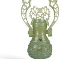 an image of a green vase sitting on top of a white surface