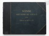 an old black book with gold lettering on a white background