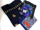 several different types of scarves are laid out on a white surface