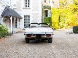 a car that is parked in front of a house