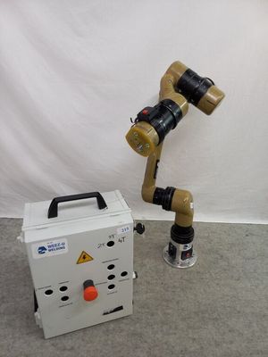 a robot that is standing next to a box
