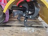 a close up of a tractor wheel on a pallet