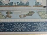 a picture of a painting on the wall of a room