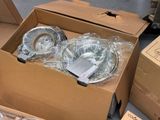 a cardboard box that has some electronic equipment inside of it