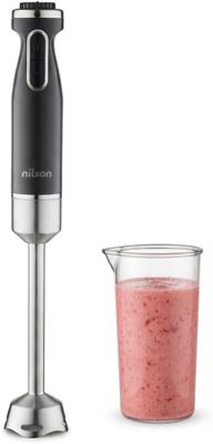 un mixeur et un verre contenant un smoothie