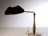 an image of a desk lamp on a table with a white background