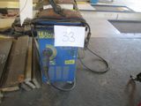 an image of a welding machine in a garage