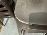 many chairs that are dirty and dirty in the room