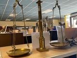 a scale that is sitting on a table in an office