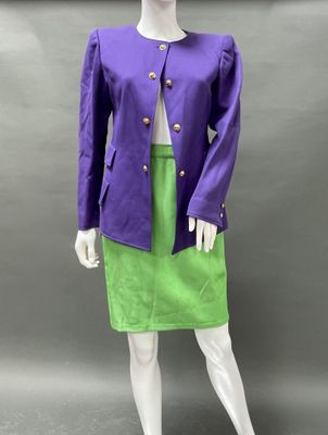 an image of a mannequin wearing a purple jacket and green skirt