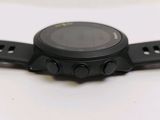 a close up of a smart watch on a white surface