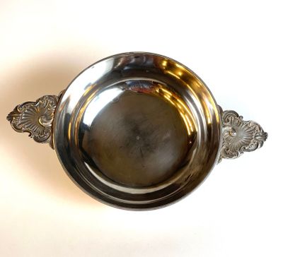 an image of a silver bowl on a white surface