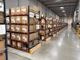 a large warehouse with lots of boxes on the shelves