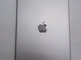 the back of an apple ipad with a sticker on it