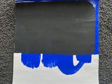 a piece of paper with a blue and white design on it
