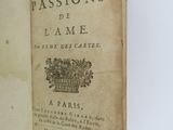 an open book with a picture of a crown on it