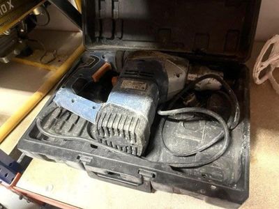 a tool in a tool box on the floor