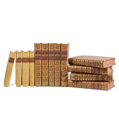 a stack of books sitting on top of each other next to each other