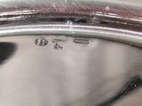 a close up of a metal pan with a handle