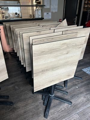 a lot of tables that are sitting on the floor