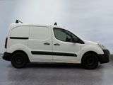 the white van is parked in the parking lot with its door open