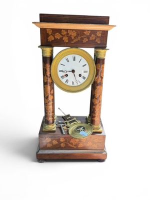 a clock that is sitting on top of a table