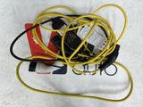 a yellow cord and a black cord connected to a power cord