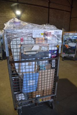 a large metal cart with a lot of items in it