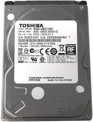 a close up of a hard drive on a white surface