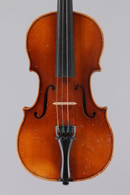 a close up of a violin with a bow on a white background