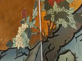 two panels of a painting on the wall of a bathroom