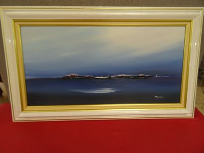Tableau à l'huile encadré représentant une vue sur l'océan avec un bateau au loin