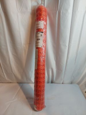 a roll of red plastic mesh on a white surface
