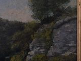 a picture of a painting on the wall of a room