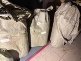 three bags that are sitting on the ground