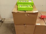 a stack of boxes sitting on a pallet in a room