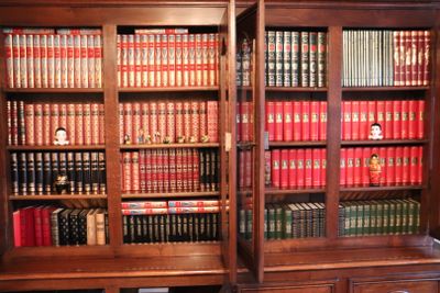 many books on the bookshelves in the library