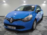a blue car is parked in a room with a checkered floor