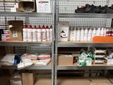 many boxes and boxes on the shelves in the garage