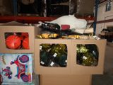 a cardboard box filled with assorted items in a warehouse