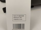 a label on the back of a black suitcase