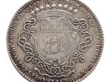 a close up of a coin on a white background