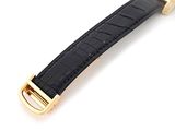 a close up of a wrist watch with a black strap