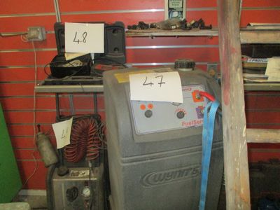 an image of a water heater in a garage