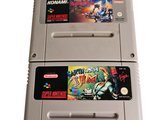 two nintendo games sitting on top of each other