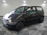 a small black car parked on a checkered floor