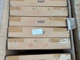 several cardboard boxes stacked on top of each other in a room