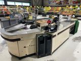 an image of a grocery store with a cash register