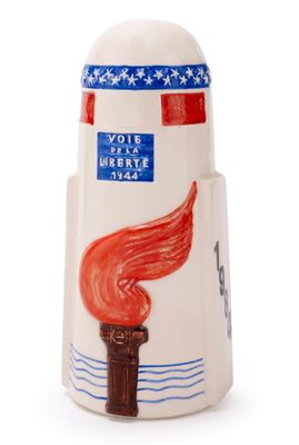 a salt shaker with a picture of a torch on it